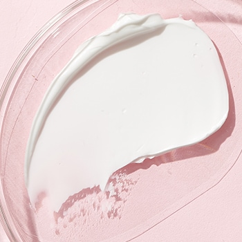 white product texture on pink background