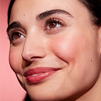 woman face wearing lipstick shade Honey Bloom
